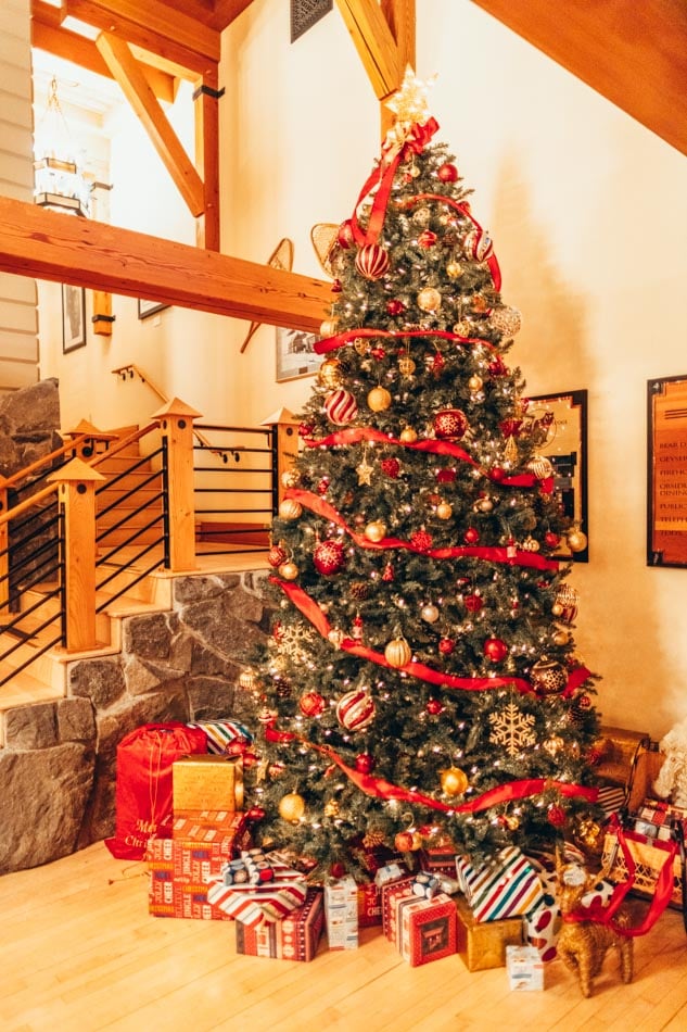 A decorated Christmas tree at Old Faithful Snow Lodge during the holidays in Yellowstone National Park