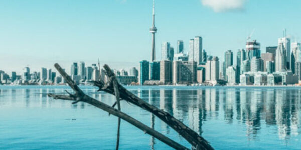 cropped-A-view-of-downtown-Toronto-from-the-icy-water-during-winter-in-Toronto-Ontario-Unsplash.jpg
