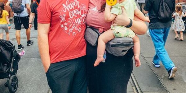Family of 3 in Disney World with a baby